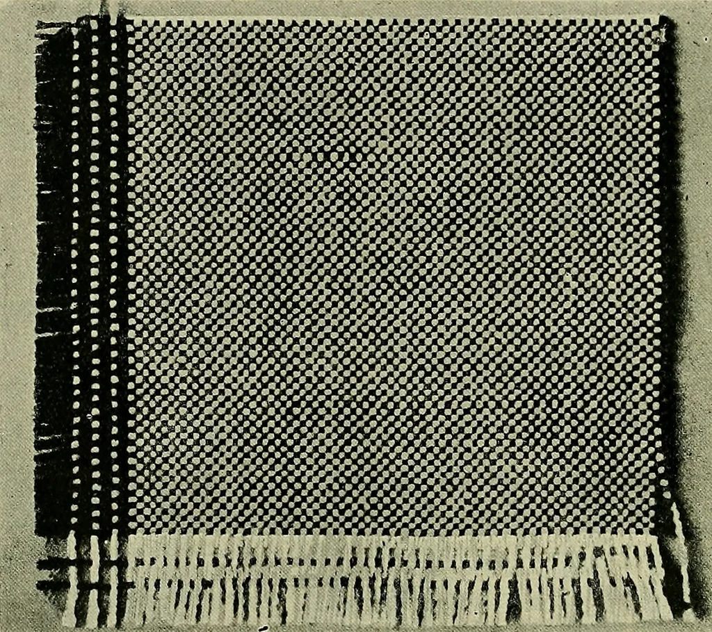 An illustration from Textiles, 1922, leaf 221