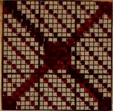 An illustration from [Weaving pattern and sample book, 1900, leaf 117