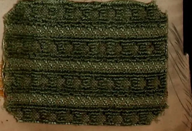 An illustration from [Weaving pattern and sample book, 1900, leaf 37