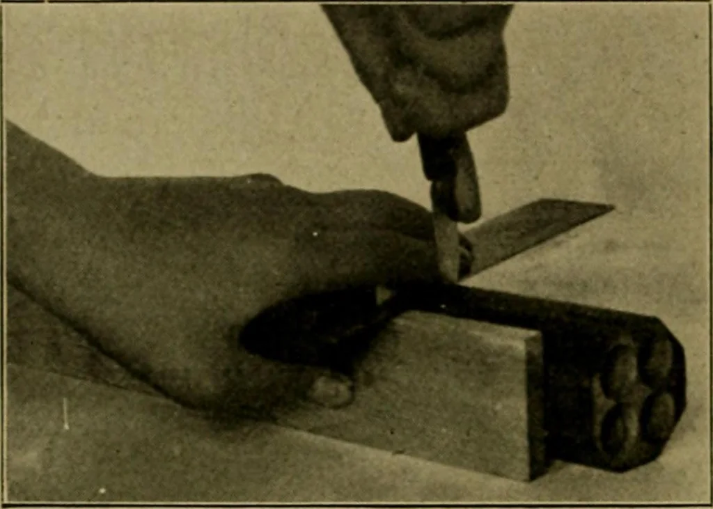 An illustration from Woodwork for the grades, for use in manual training classes; fully illustrated with three hundred half-tone engravings from actual shop practice, and many working drawings of educational shop problems, 1913, leaf 203