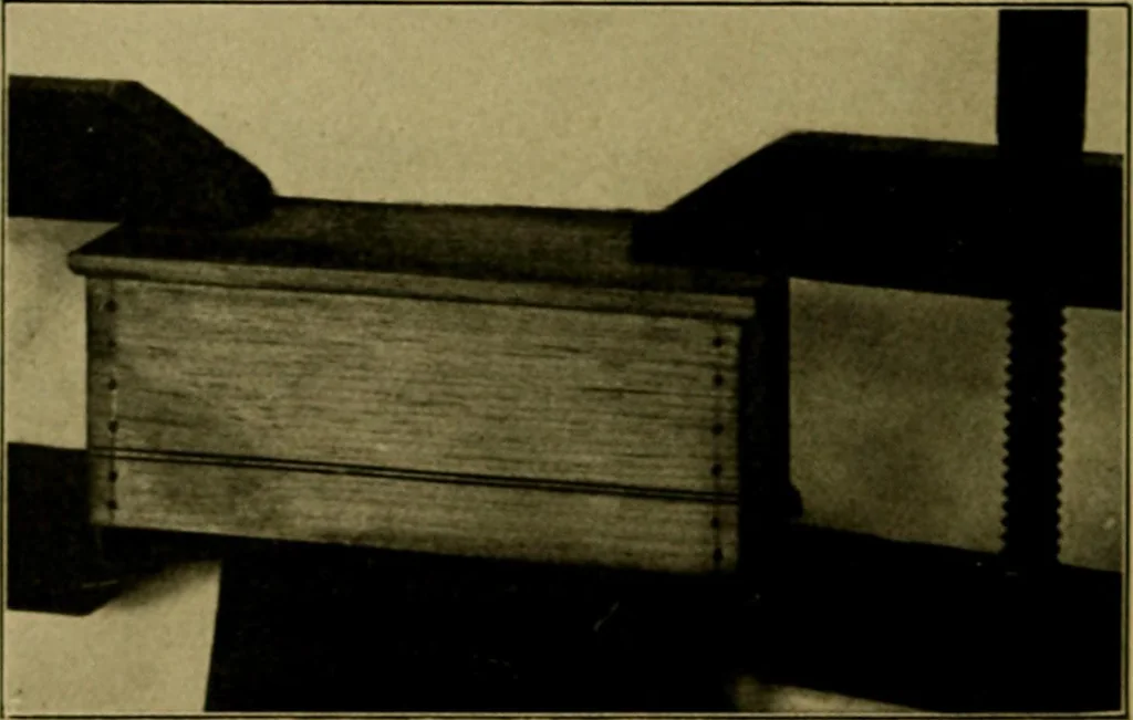 An illustration from Woodwork for the grades, for use in manual training classes; fully illustrated with three hundred half-tone engravings from actual shop practice, and many working drawings of educational shop problems, 1913, leaf 215