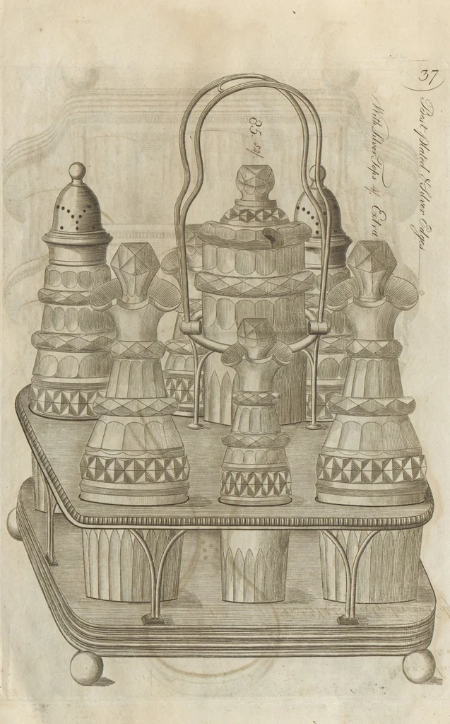 An illustration from Engraved pattern book or trade catalogue of Sheffield plate, including cruet, soy frames, dinnerware, soup tureens, sauce boats, platters, coasters, salt cellars, mustard pots, serving pieces, utensils, cake baskets, tea urns, candlesticks, candelabra, oil lamps, snuffers and more, 1800, leaf 27