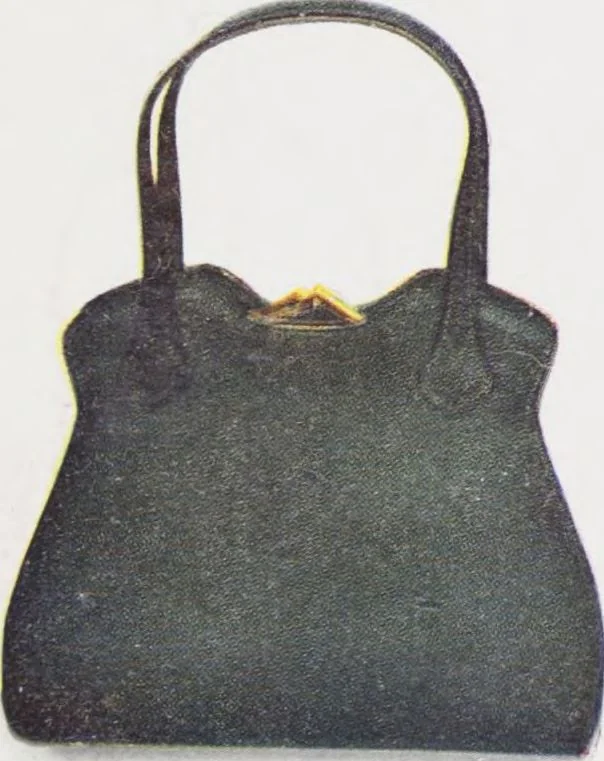 An illustration from Boots leather goods, fancy, silver, toilet, and bound book depts. Season 1910-11, 1910, leaf 18