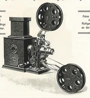 An illustration from Preisliste über optische, mechanische und elektrische Waren, Physikalische Spiele und Lehrmittel: Abteilung I. Laterna Magica, Projektions-Apparate, Postkarten-Cameras, Kinematographen, Lupen und Lesegläser, Extra-Laterna Magica-Bilder und bewegliche Verwandlungsbilder, Films (1914)