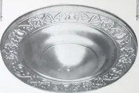 An illustration from Illustrated catalog of ornamental spun and stamped shells and fittings for gas and electric fixtures manufactured by the Standard Metal Spinning Co. (1914)