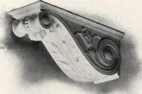 An illustration from Illustrated catalogue of composition capitals and brackets. (1906)
