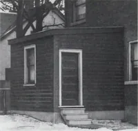 An illustration from Readi-cut houses (frame or brick veneer) : substantial, warm, comfortable, attractive : manufactured in our mills in Toronto, Ottawa, Vancouver ... (1915)