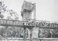 An illustration from The Strauss Bascule Bridge Company, Inc., engineers and designers of trunnion, bascule and direct lift bridges. (1920)