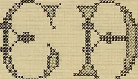 An illustration from Album de broderies au point de croix (1885)