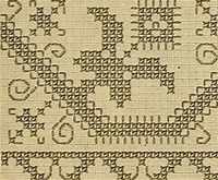 An illustration from Album de broderies au point de croix (1885)