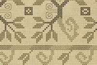 An illustration from Album de broderies au point de croix (1885)