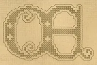An illustration from Album de broderies au point de croix (1890)