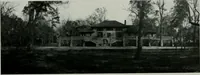 An illustration from American country houses of to-day; an illustrated account of some excellent houses built and gardens planted during the last few years, showing unmistakable influence of the modern trend in ideals architectural (1915)