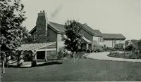 An illustration from American country houses of to-day; an illustrated account of some excellent houses built and gardens planted during the last few years, showing unmistakable influence of the modern trend in ideals architectural (1915)