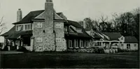 An illustration from American country houses of to-day; an illustrated account of some excellent houses built and gardens planted during the last few years, showing unmistakable influence of the modern trend in ideals architectural (1915)