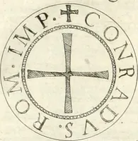 An illustration from Aquila franca sub qua Francones imperatores a Conrado II Salico vsquè ad Lotharium II Occidentis imperatorem XX : elogiis, hieroglyphicis, numismatibus, insignibus, symbolis, imaginibus antiquis ad viuum exhibentur exculpti, & longa historiarum serie exarati : vt nihil relictum sit, quod prisci vel hodierni habeant annales, sed diplomata, leges, indulta, genealogiae, donationes, priuilegia offeruntur congesta : inseruntur et regum principumque imagines, nummi honorarij, castrenses, triumphales, votiui, missiles, &c. qui sanguine, foedere, bello imperatoribus iuncti, occurrunt in opere : accedit cuique Caesarum tractatus sacrolegalis, & historicopoliticus ... (1679)