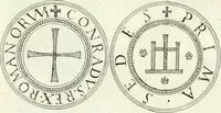 An illustration from Aquila franca sub qua Francones imperatores a Conrado II Salico vsquè ad Lotharium II Occidentis imperatorem XX : elogiis, hieroglyphicis, numismatibus, insignibus, symbolis, imaginibus antiquis ad viuum exhibentur exculpti, & longa historiarum serie exarati : vt nihil relictum sit, quod prisci vel hodierni habeant annales, sed diplomata, leges, indulta, genealogiae, donationes, priuilegia offeruntur congesta : inseruntur et regum principumque imagines, nummi honorarij, castrenses, triumphales, votiui, missiles, &c. qui sanguine, foedere, bello imperatoribus iuncti, occurrunt in opere : accedit cuique Caesarum tractatus sacrolegalis, & historicopoliticus ... (1679)