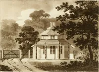 An illustration from Architectural sketches for cottages, rural dwellings, and villas, in the Grecian, Gothic, and fancy styles : with plans suitable to persons of genteel life and moderate fortune : preceded by some observations on scenery and character proper for picturesque buildings (1805)