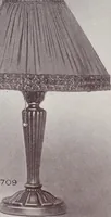 An illustration from Armor bronze : artistic and ideal gifts in book ends, door stops, art objects, table and floor lamps (1900)
