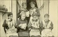 An illustration from Bobbins of Belgium; a book of Belgian lace, lace-workers, lace-schools and lace-villages (1920)
