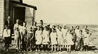 An illustration from The church on the changing frontier; a study of the homesteader and his church (1922)