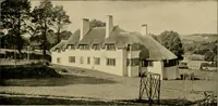An illustration from Country-cottages and week-end homes (1912)