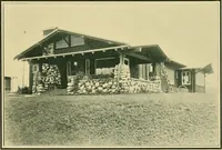 An illustration from Craftsman bungalows : a collection of the latest designs dedicated to the lover of a convenient home by Jud Yoho. (1912)