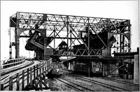 An illustration from Material handling cyclopedia; a reference book covering definitions, descriptions, illustrations and methods of use of material handling machines employed in industry (1921)