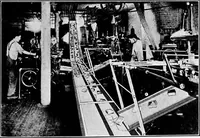 An illustration from Material handling cyclopedia; a reference book covering definitions, descriptions, illustrations and methods of use of material handling machines employed in industry (1921)