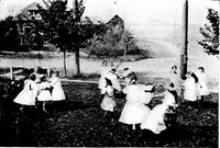An illustration from Play, comprising games for the kindergarten, playground, schoolroom and college; how to coach and play girls' basket-ball, etc (1918)