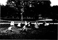 An illustration from Play, comprising games for the kindergarten, playground, schoolroom and college; how to coach and play girls' basket-ball, etc (1918)