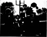 An illustration from Play, comprising games for the kindergarten, playground, schoolroom and college; how to coach and play girls' basket-ball, etc (1918)