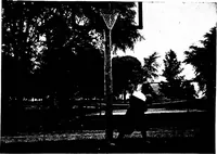 An illustration from Play, comprising games for the kindergarten, playground, schoolroom and college; how to coach and play girls' basket-ball, etc (1918)