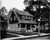 An illustration from The housing book; containing photographic reproductions, with floor plans of workingmen's homes. One and two family houses of frame, brick, stucco and concrete construction; also four, six and nine family apartments. Showing single houses, groups and developments that have been built in various parts of the United States (1919)