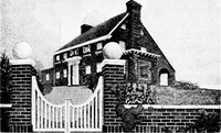 An illustration from The housing book; containing photographic reproductions, with floor plans of workingmen's homes. One and two family houses of frame, brick, stucco and concrete construction; also four, six and nine family apartments. Showing single houses, groups and developments that have been built in various parts of the United States (1919)