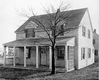 An illustration from The housing book; containing photographic reproductions, with floor plans of workingmen's homes. One and two family houses of frame, brick, stucco and concrete construction; also four, six and nine family apartments. Showing single houses, groups and developments that have been built in various parts of the United States (1919)