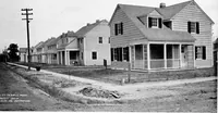 Picture 30 of 171 from The housing book; containing photographic reproductions, with floor plans of workingmen's homes. One and two family houses of frame, brick, stucco and concrete construction; also four, six and nine family apartments. Showing single houses, groups and developments that have been built in various parts of the United States (1919), leaf 38
