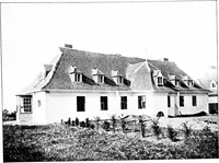 An illustration from Country cottages and week-end homes, by J. H. Elder-Duncan ... with numerous illustrations and plans of cottages by well-known architects (1912)
