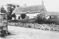 An illustration from Picturesque English cottages and their doorway gardens (1905)