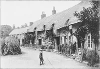An illustration from Picturesque English cottages and their doorway gardens (1905)