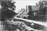 An illustration from Picturesque English cottages and their doorway gardens (1905)