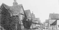 An illustration from Picturesque English cottages and their doorway gardens (1905)