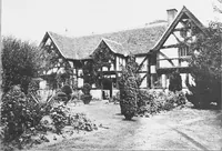 An illustration from Picturesque English cottages and their doorway gardens (1905)