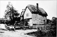 An illustration from Picturesque English cottages and their doorway gardens (1905)