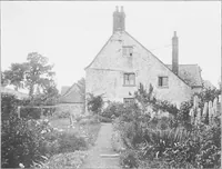 An illustration from Picturesque English cottages and their doorway gardens (1905)
