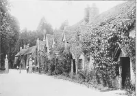 An illustration from Picturesque English cottages and their doorway gardens (1905)