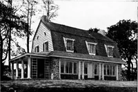 An illustration from Inexpensive homes of individuality; being a collection of photographs and floor plans illustrating certain of America's best country and suburban homes of moderate size (1915)