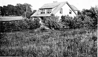 An illustration from Inexpensive homes of individuality; being a collection of photographs and floor plans illustrating certain of America's best country and suburban homes of moderate size (1915)