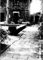 An illustration from The livable house, its garden (1917)