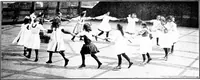 An illustration from Folk-dances and singing games; Dances of the people (1909)